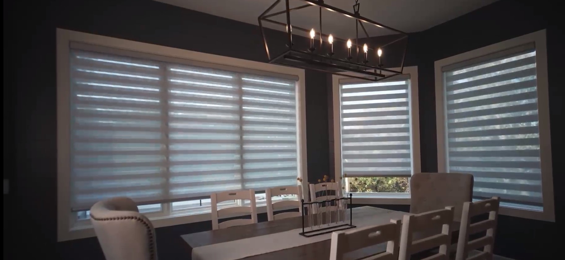 motorization lowering shades in dining room of home